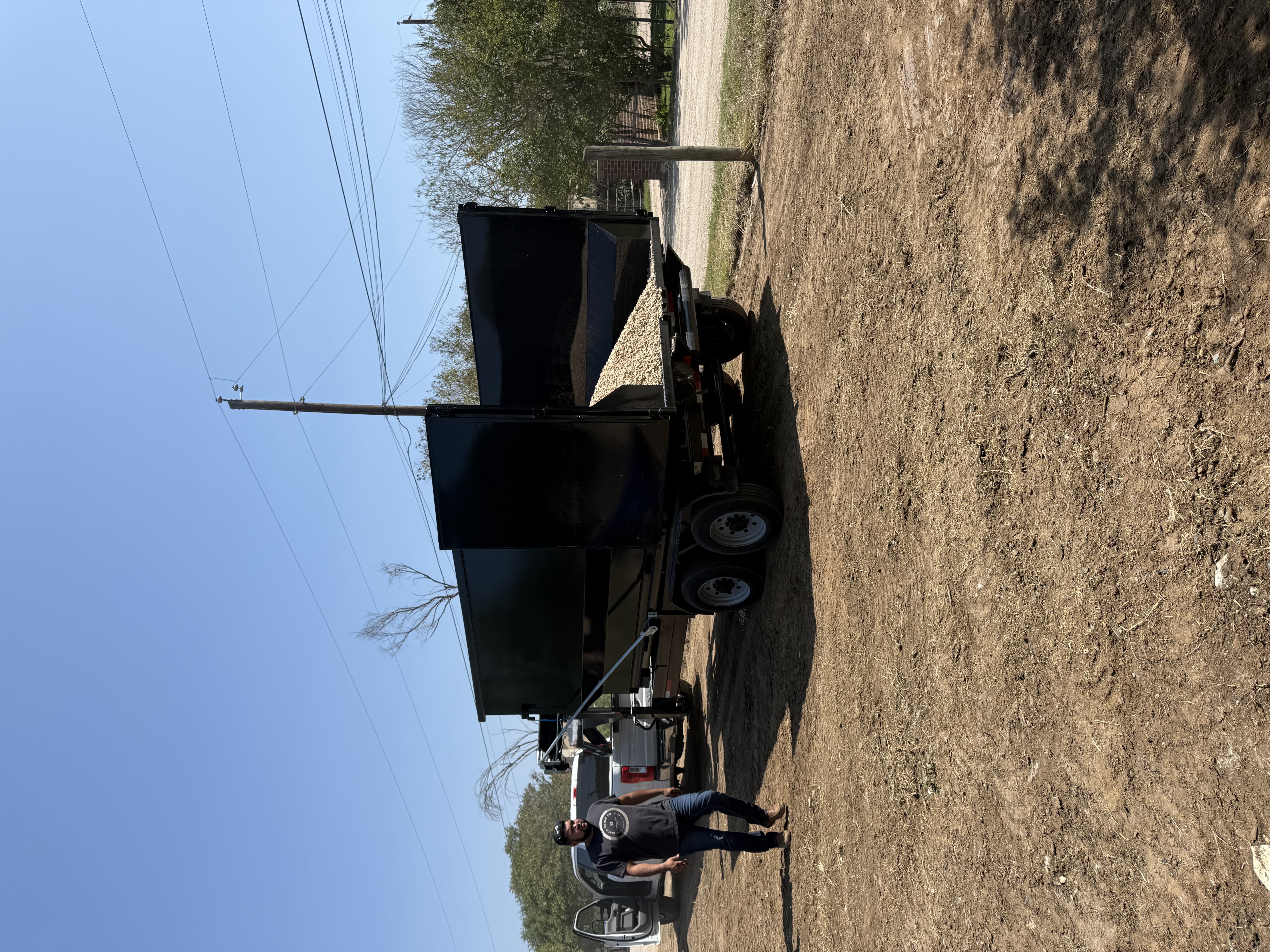 V5 Inc. trailer delivering material at a job site
